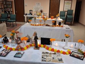 Additional Día de los Muertos altars set up in our community room.